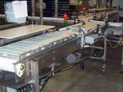 Industrial pick and place conveyor system used for automated product handling and manufacturing line efficiency.